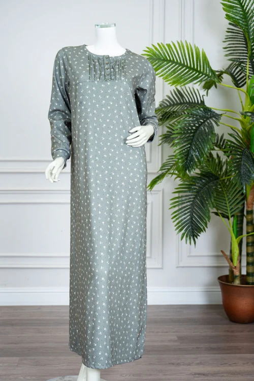 قميص نسائي شتوي طويل لون زيتي  مشجر باللون الأبيض ياقة دائرية بأزرار و بأكمام طويلة