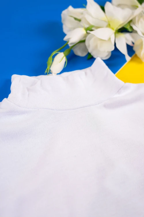 بيجاما ولادي شتوي قطعتين لون أبيض بلوزة بياقة عالية و أكمام طويلة مع بنطلون طويل