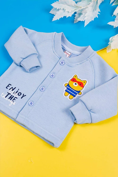 طقم-قطعتين-ولادي-بلوزة-لون-سماوي-مزينة-برسومات-