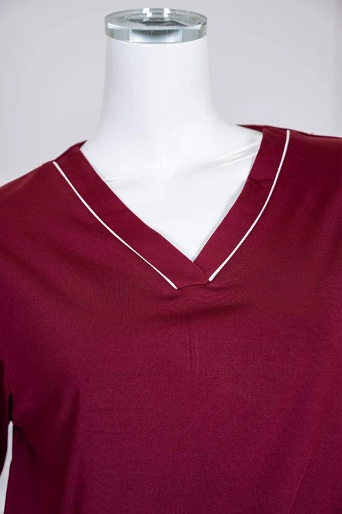 بيجاما-نسائية-قطعتين-لون-عودي-برسومات-و-كتابات