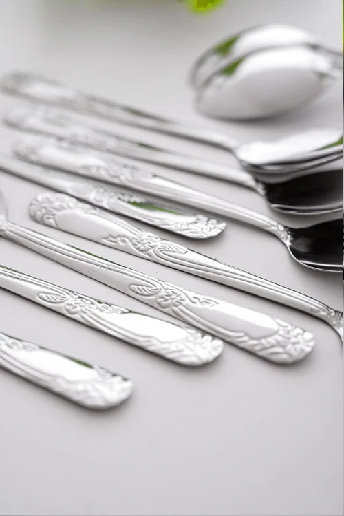 ملاعق أكل ستيل مزينة بزخرفة في المقبض 12 حبة