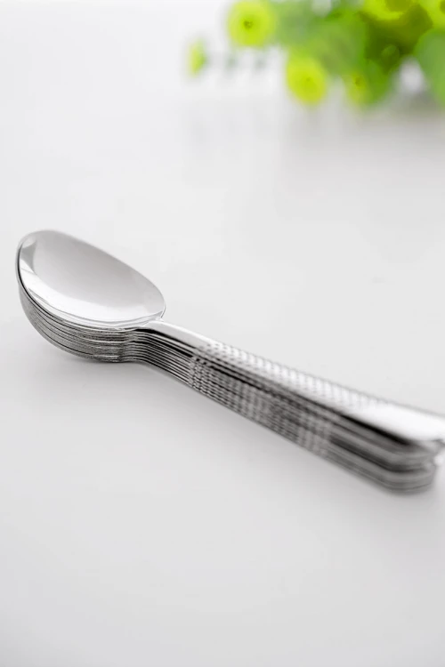 طقم ملاعق أكل مزينة بنقوش في المقبض 12 حبة