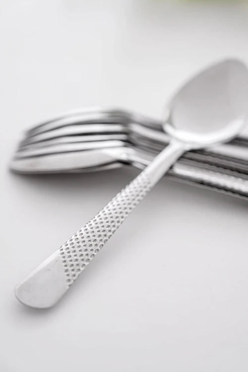 طقم ملاعق أكل مزينة بنقوش في المقبض 12 حبة