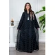 جلابية نسائية لون أسود ياقة عالية بقصة سبعة مزينة بفصوص باللون الفضي و بأكمام طويلة
