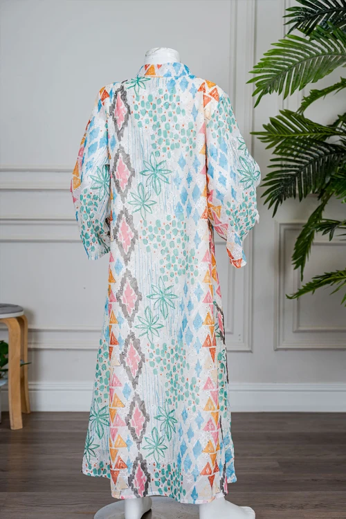 جلابية بناتي لون اوف وايت مزينة بأشكال و رسومات ملونة و بفصوص ياقة عالية بقصة سبعة و بأكمام طويلة