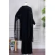 فستان نسائي لون أسود قطعتين ياقة دائرية بأكمام طويلة مزين بفصوص من الأمام مع شيفون ملكي
