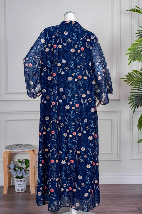 جلابية نسائي لون كحلي مزينة بالورود الملونة ياقة عالية بقصة سبعة و أكمام طويلة