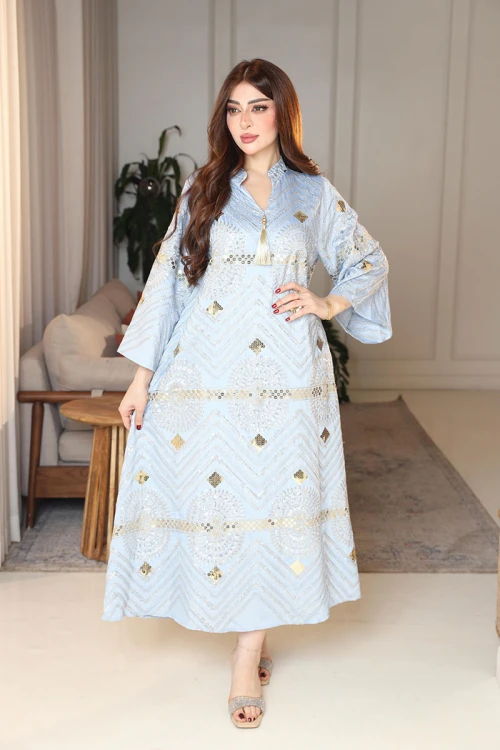 جلابية نسائية لون سماوي ياقة عالية بقصة سبعة مزينة بالترتر و تطريزات ذهبية و بأكمام طويلة