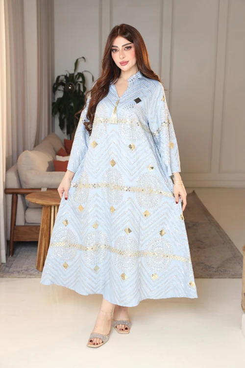 جلابية نسائية لون سماوي ياقة عالية بقصة سبعة مزينة بالترتر و تطريزات ذهبية و بأكمام طويلة