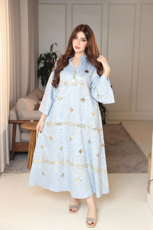 جلابية نسائية لون سماوي ياقة عالية بقصة سبعة مزينة بالترتر و تطريزات ذهبية و بأكمام طويلة
