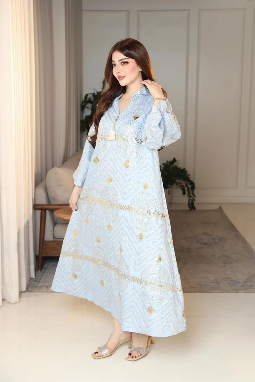 جلابية نسائية لون سماوي ياقة عالية بقصة سبعة مزينة بالترتر و تطريزات ذهبية و بأكمام طويلة