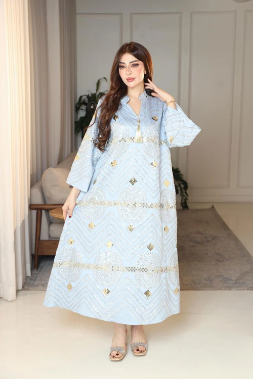 جلابية نسائية لون سماوي ياقة عالية بقصة سبعة مزينة بالترتر و تطريزات ذهبية و بأكمام طويلة