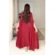 فستان نسائي لون أحمر ياقة قصة سبعة و بأكمام طويلة مزين بتطريز فضي من الجنب