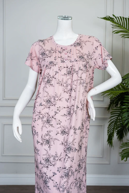 قميص نسائي طويل لون خربزي مشجر ياقة دائرية بأزرار من الأمام و بأكمام قصيرة