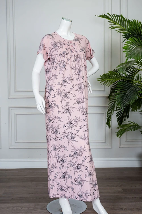 قميص نسائي طويل لون خربزي مشجر ياقة دائرية بأزرار من الأمام و بأكمام قصيرة