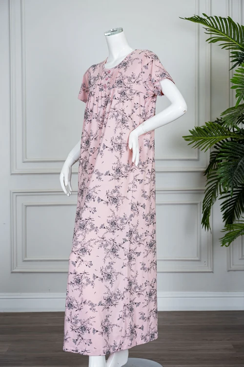 قميص نسائي طويل لون خربزي مشجر ياقة دائرية بأزرار من الأمام و بأكمام قصيرة