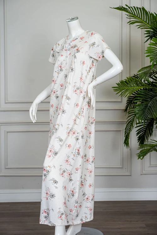 قميص نسائي طويل لون اوف وايت مشجر ياقة دائرية بأزرار من الأمام و بأكمام قصيرة