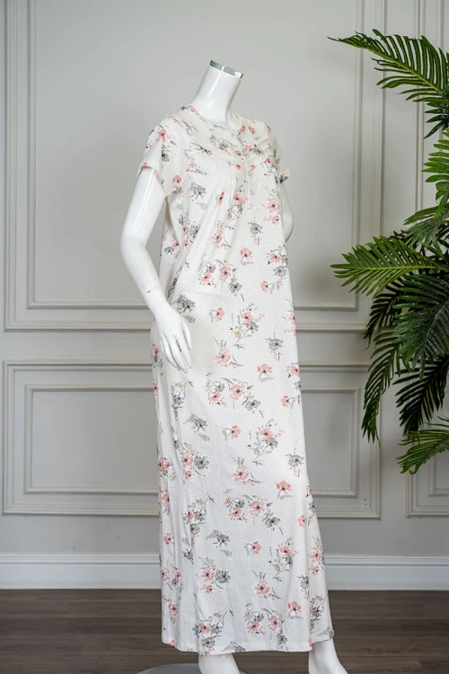 قميص نسائي طويل لون اوف وايت مشجر ياقة دائرية بأزرار من الأمام و بأكمام قصيرة