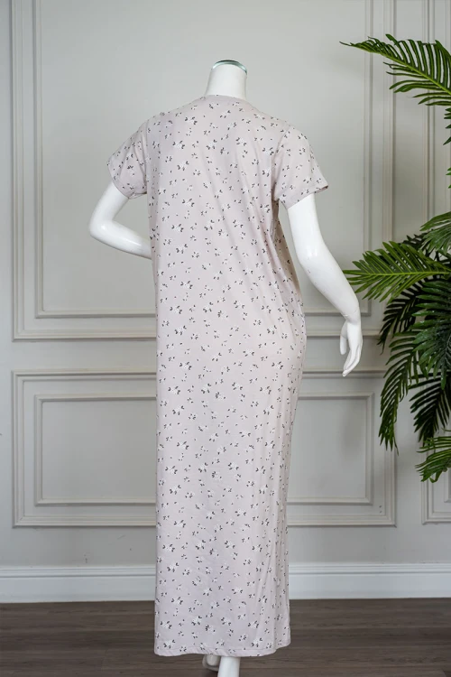 قميص نسائي طويل لون بيج مشجر ياقة دائرية بأزرار من الأمام و بأكمام قصيرة