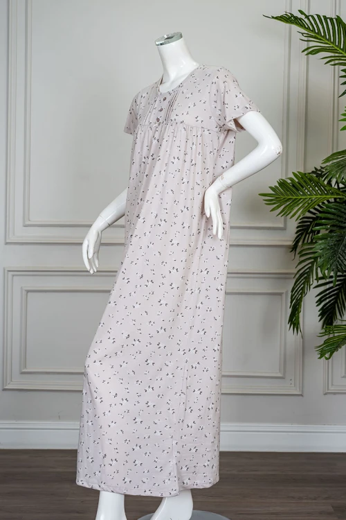 قميص نسائي طويل لون بيج مشجر ياقة دائرية بأزرار من الأمام و بأكمام قصيرة