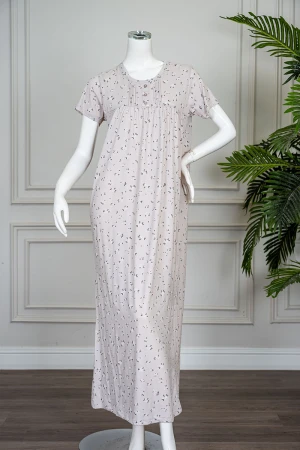 قميص نسائي طويل لون بيج مشجر ياقة دائرية بأزرار من الأمام و بأكمام قصيرة