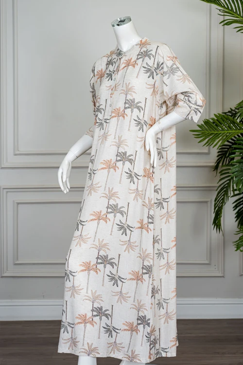 قميص نسائي طويل لون بيج مشجر ياقة دائرية بأزرار من الأمام و بأكمام ميدي