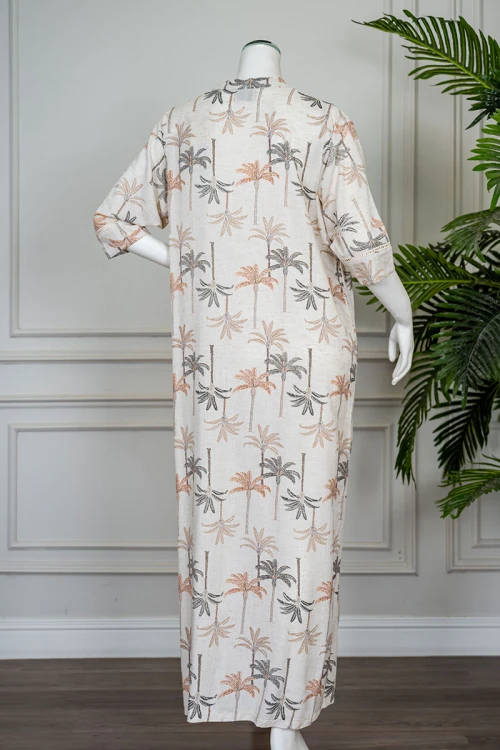 قميص نسائي طويل لون بيج مشجر ياقة دائرية بأزرار من الأمام و بأكمام ميدي