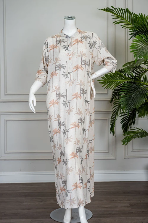 قميص نسائي طويل لون بيج مشجر ياقة دائرية بأزرار من الأمام و بأكمام ميدي