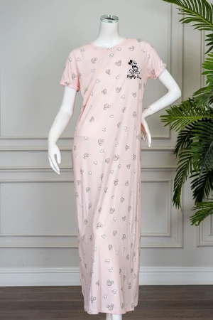 قميص نسائي طويل لون خربزي مزين بكتابات و رسومات ياقة دائرية و بأكمام قصيرة