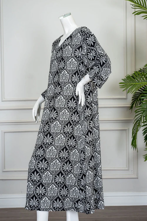 قميص نسائي طويل لون أسود و فضي مشجر ياقة بقصة سبعة و بأكمام طويلة