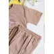 طقم ولادي قطعتين لون بيج تيشيرت مزين بكتابات و رسومات من الأمام مع بنطلون طويل بجيوب و رباط في الخصر