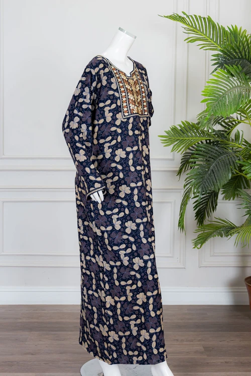 قميص نسائي طويل لون كحلي مشجر ياقة بكلفة مطرزة من الأمام و بأكمام طويلة