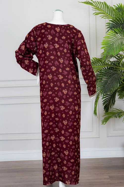 جلابية نسائية طويلة لون عودي مشجر ياقة دائرية بكلفة مطرزة من الأمام و بأكمام طويلة