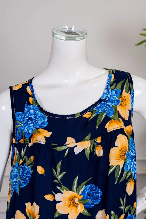 قميص نسائي قصير لون كحلي مشجر ياقة دائرية و بدون أكمام