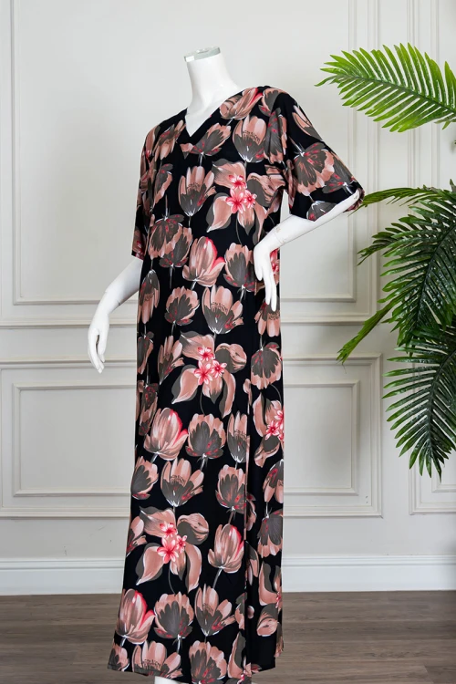 قميص نسائي طويل لون أسود مشجر ياقة قصة سبعة و أكمام قصيرة