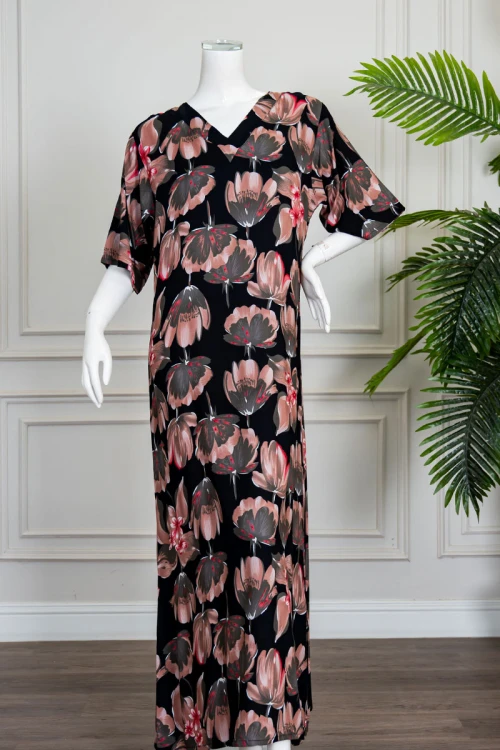 قميص نسائي طويل لون أسود مشجر ياقة قصة سبعة و أكمام قصيرة