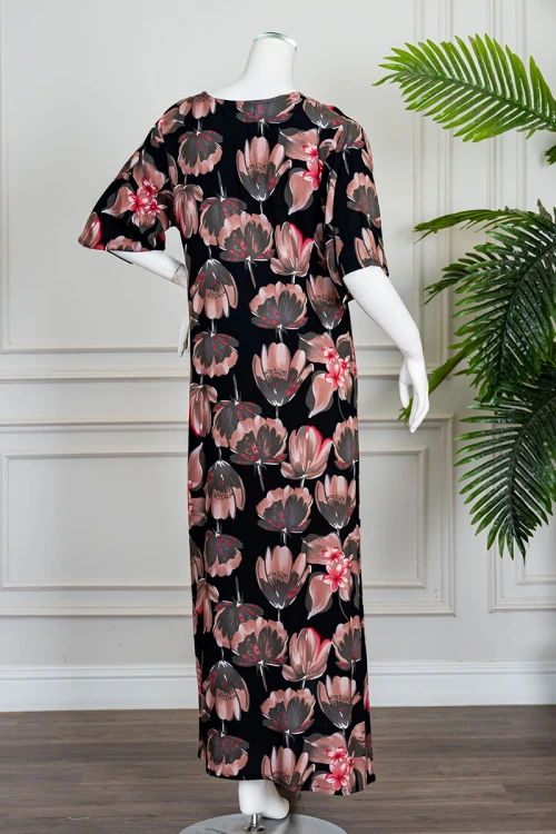 قميص نسائي طويل لون أسود مشجر ياقة قصة سبعة و أكمام قصيرة