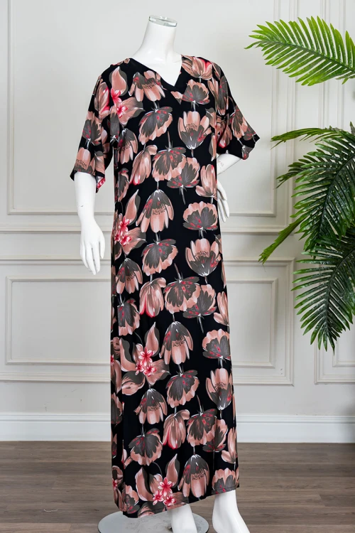 قميص نسائي طويل لون أسود مشجر ياقة قصة سبعة و أكمام قصيرة