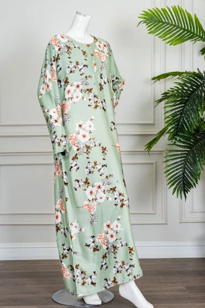 قميص نسائي طويل لون تفاحي مشجر ياقة دائرية بأزرار من الأمام و بأكمام طويلة 