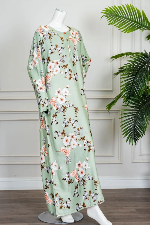 قميص نسائي طويل لون تفاحي مشجر ياقة دائرية بأزرار من الأمام و بأكمام طويلة