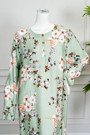 قميص نسائي طويل لون تفاحي مشجر ياقة دائرية بأزرار من الأمام و بأكمام طويلة 