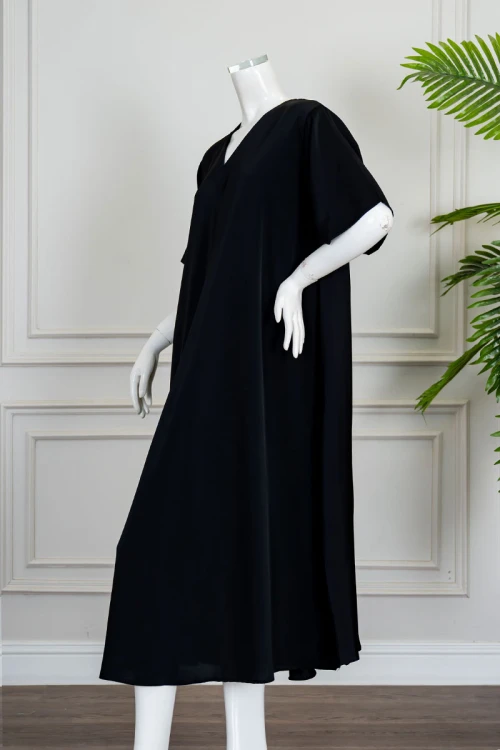 قميص نسائي قصير كلوش لون أسود ياقة قصة سبعة و بأكمام قصيرة