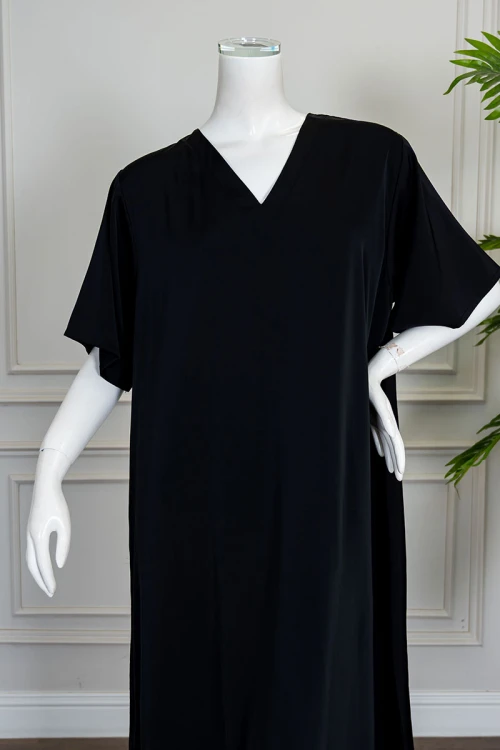 قميص نسائي قصير كلوش لون أسود ياقة قصة سبعة و بأكمام قصيرة