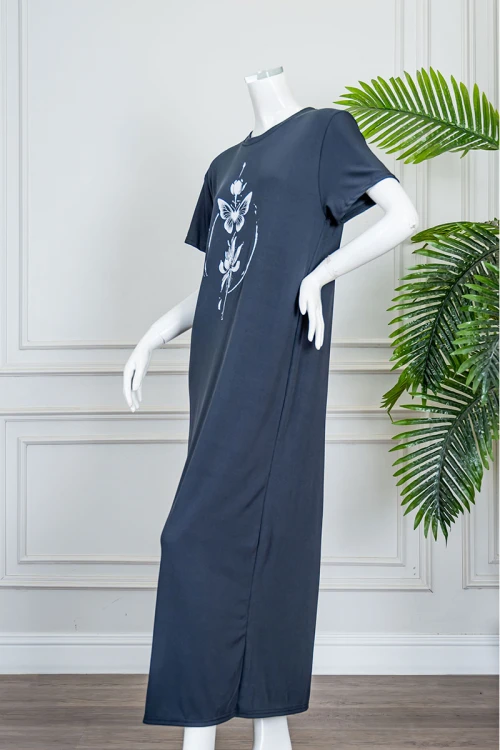 قميص نسائي طويل لون كحلي ياقة دائرية مزين برسومات من الأمام و بأكمام قصيرة