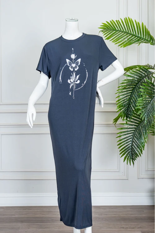 قميص نسائي طويل لون كحلي ياقة دائرية مزين برسومات من الأمام و بأكمام قصيرة